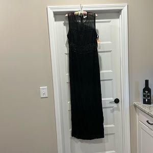 Adriana Papell Illusion Waist Gown with beautiful handmade beading detail.